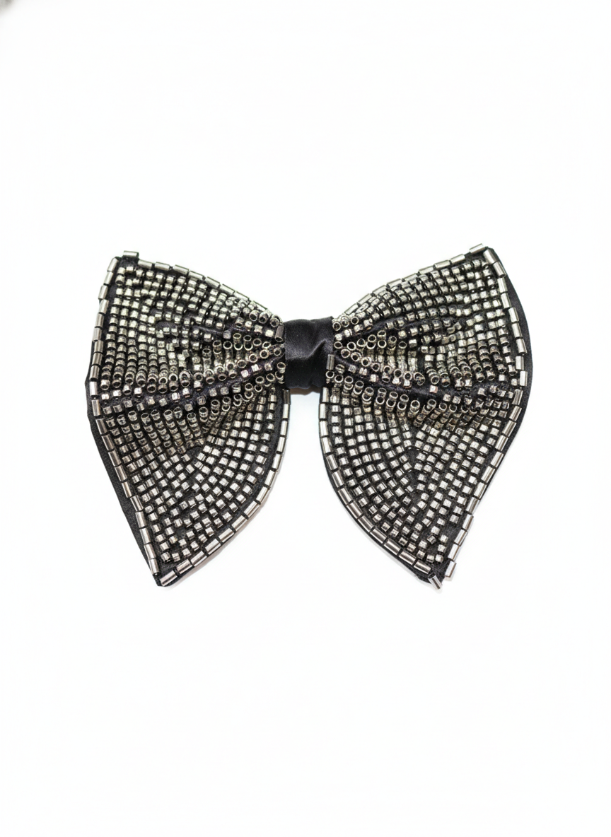 Glamorous Black Bow Accessory Adorned with Silver Bugle Beads